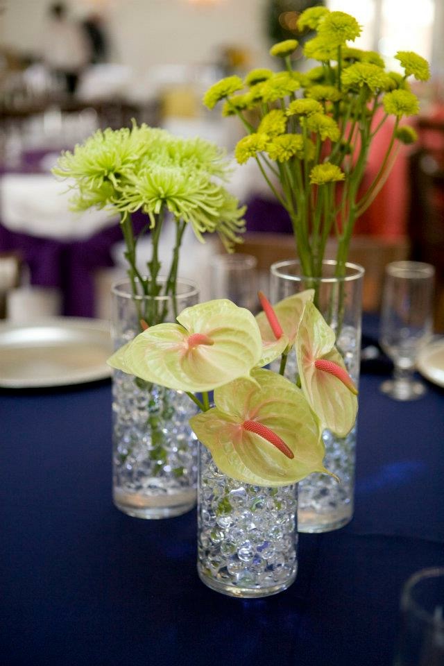 Centerpiece of green anthurium and button mums