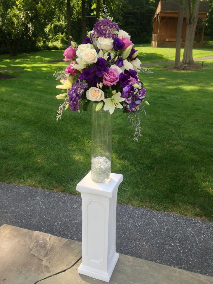 Pink and purple ceremony arrangement