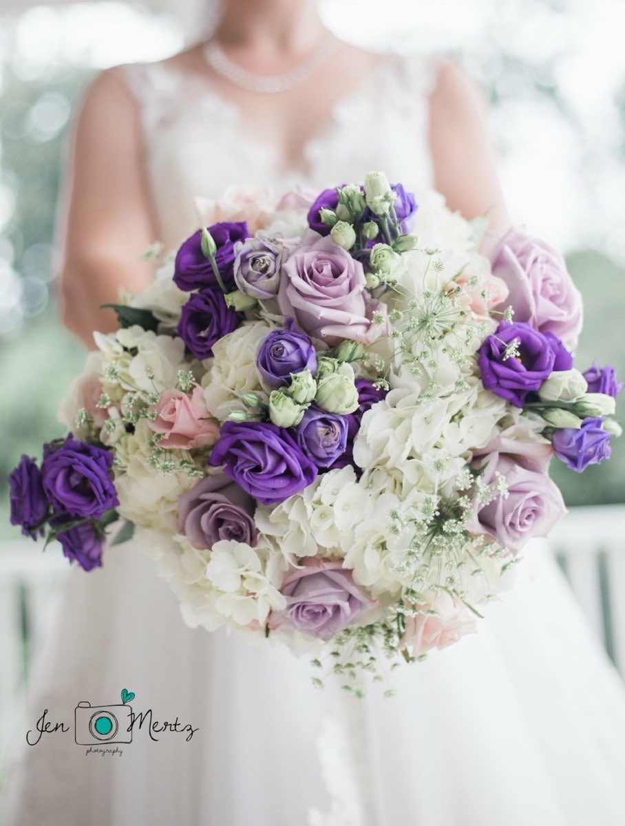 Purple lisianthus and lavender rose bridal bouquet
