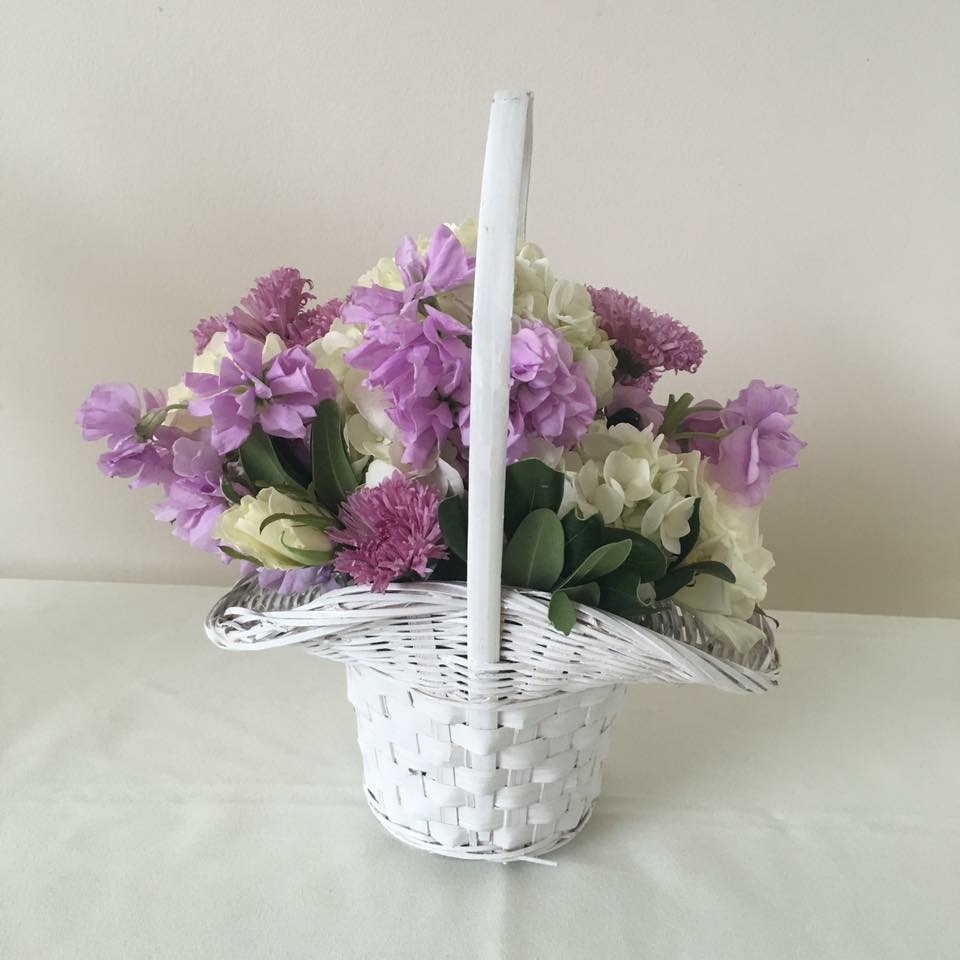 Purple and white flower girl basket