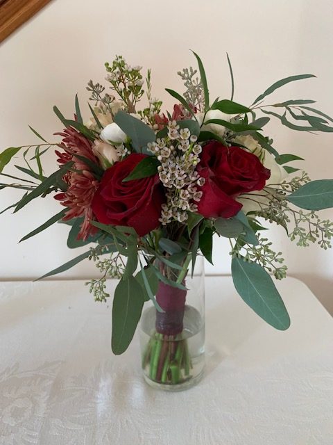 Red rose, mum, and Queen Anne's lace bouquet with silver dollar eucalyptus